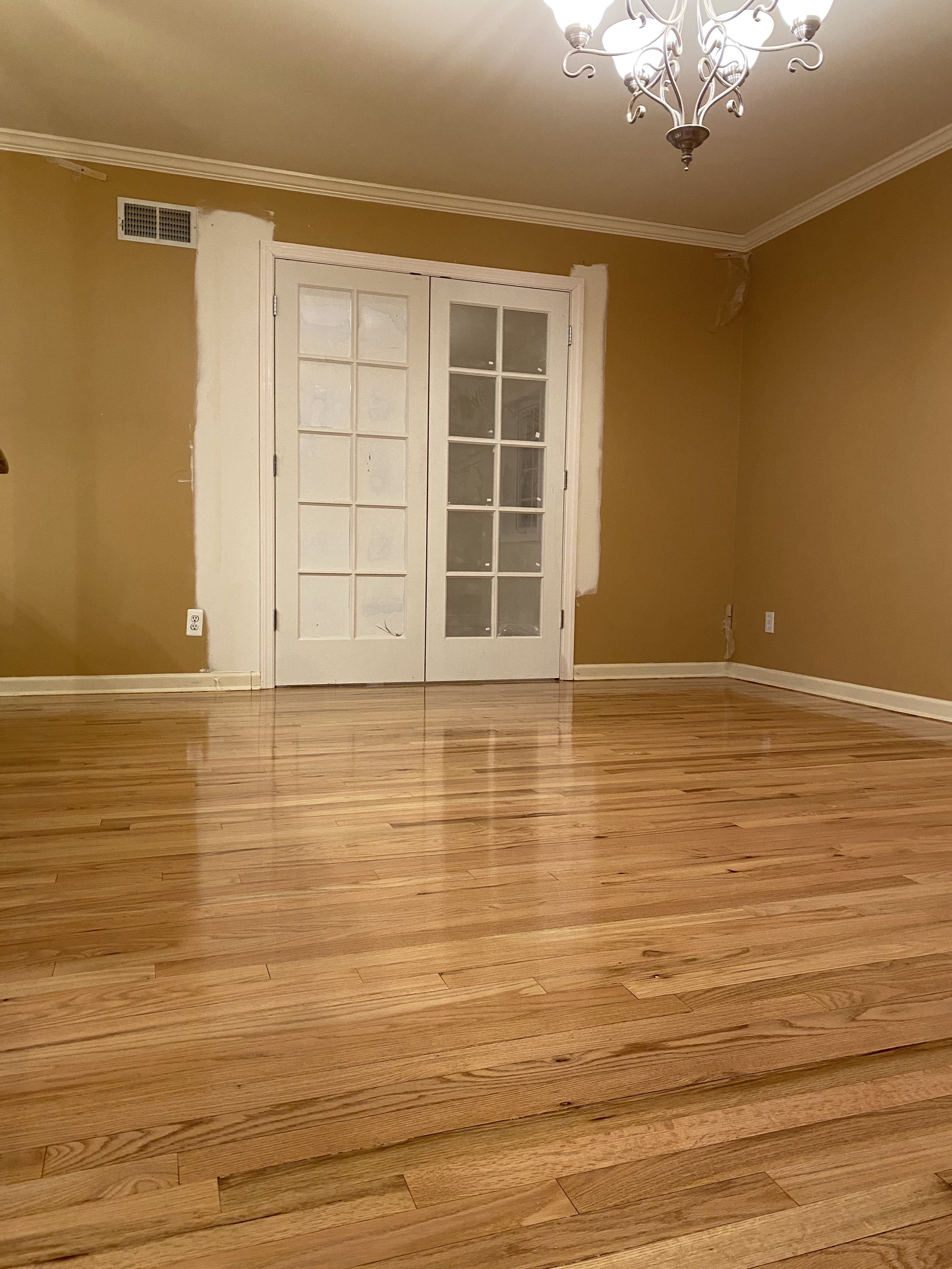 Sanded hardwood floor ready for finishing