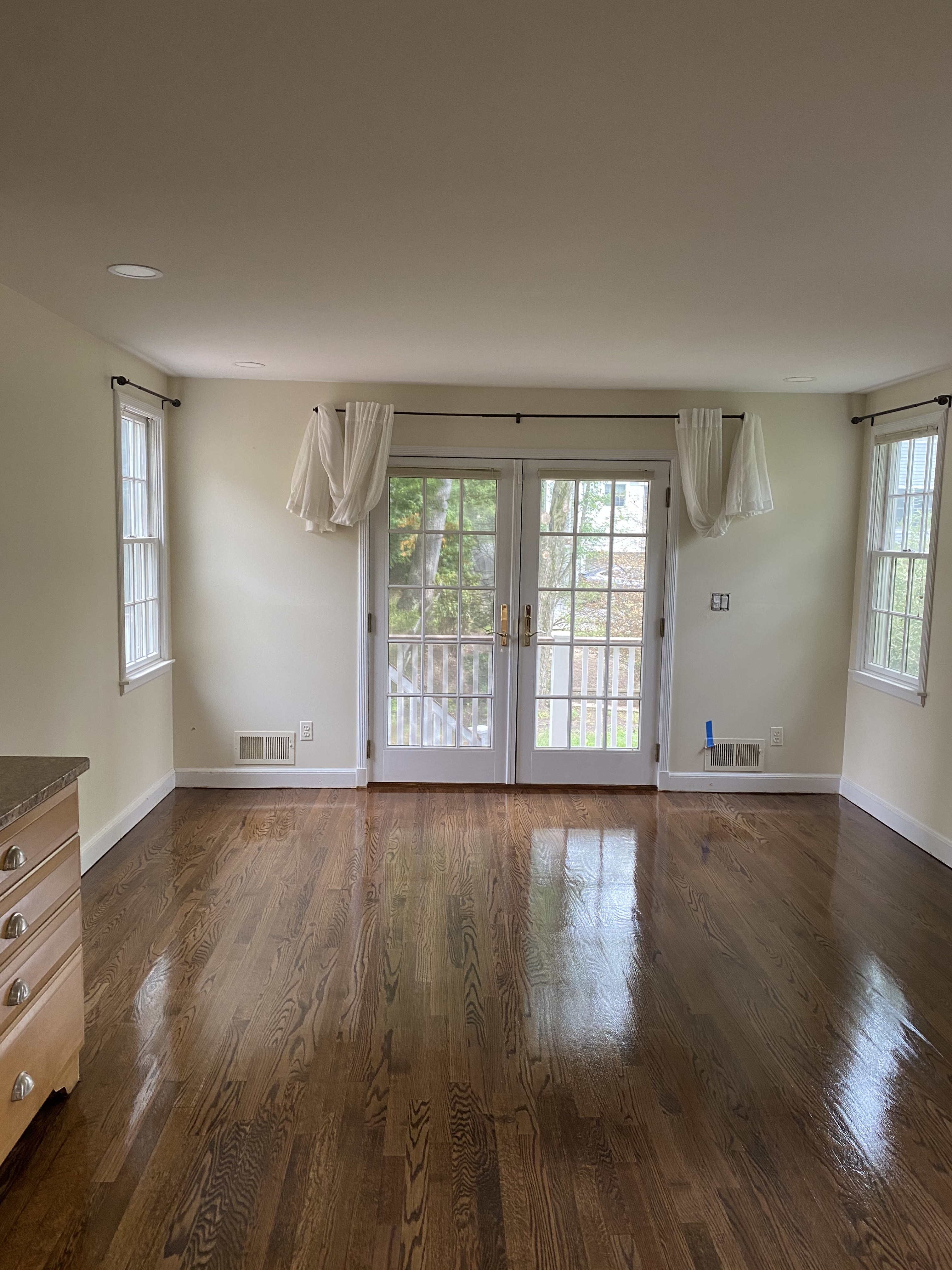 Sanded hardwood floor prepared for finishing