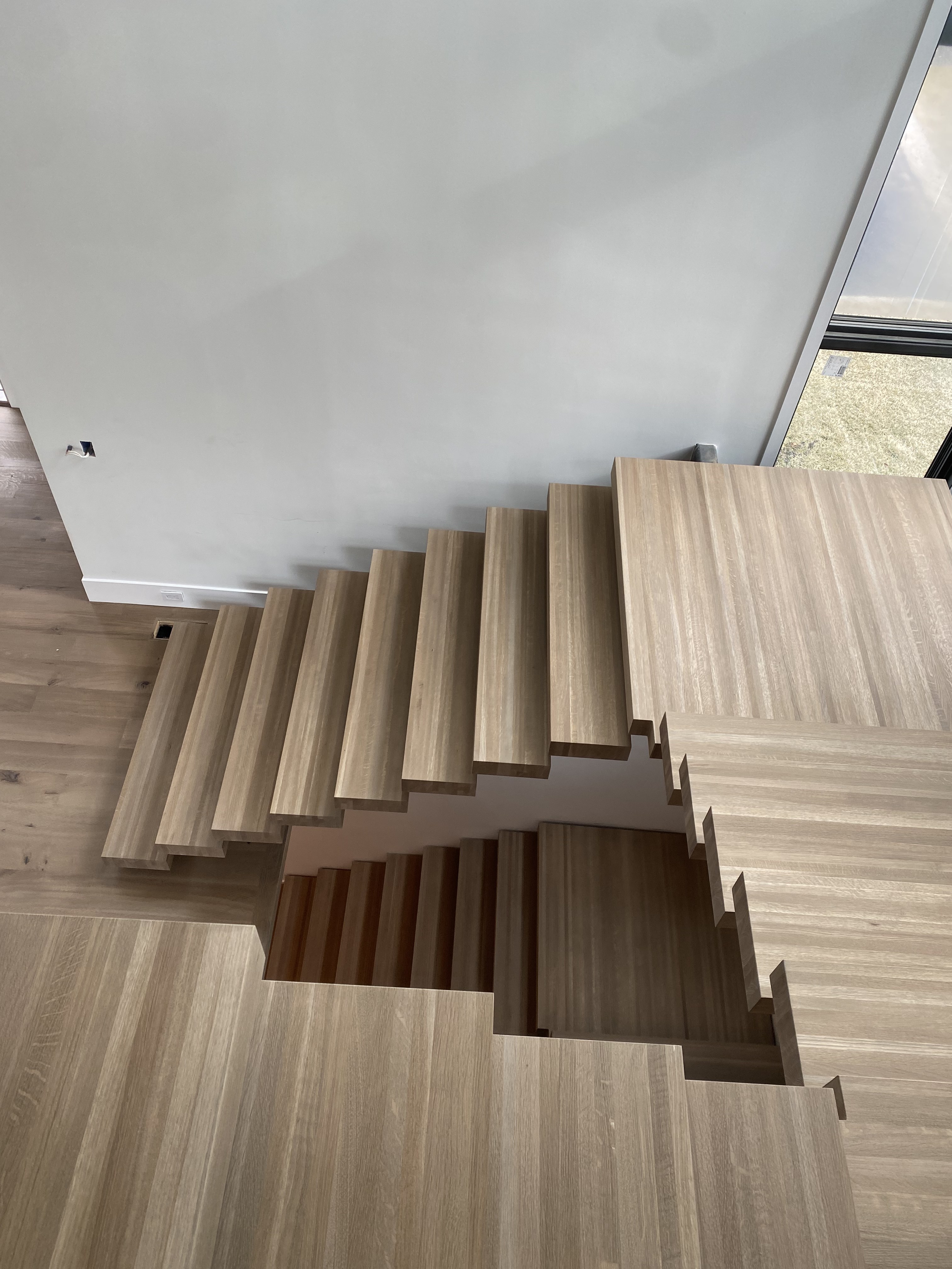 Custom staircase project by Kingdom Flooring