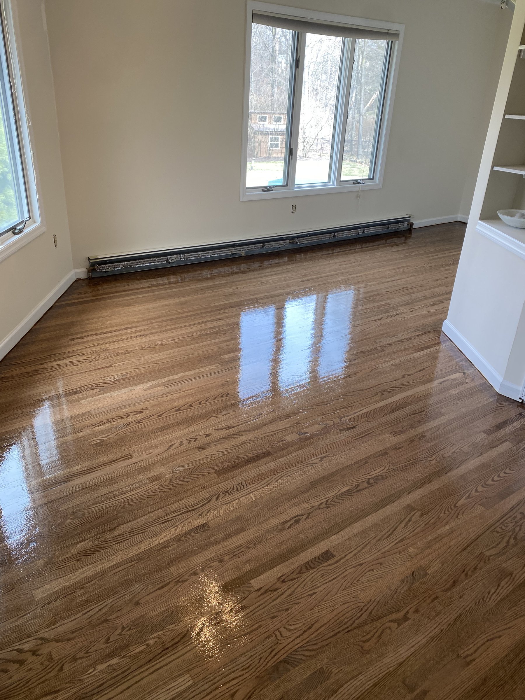 Freshly refinished hardwood floor detail