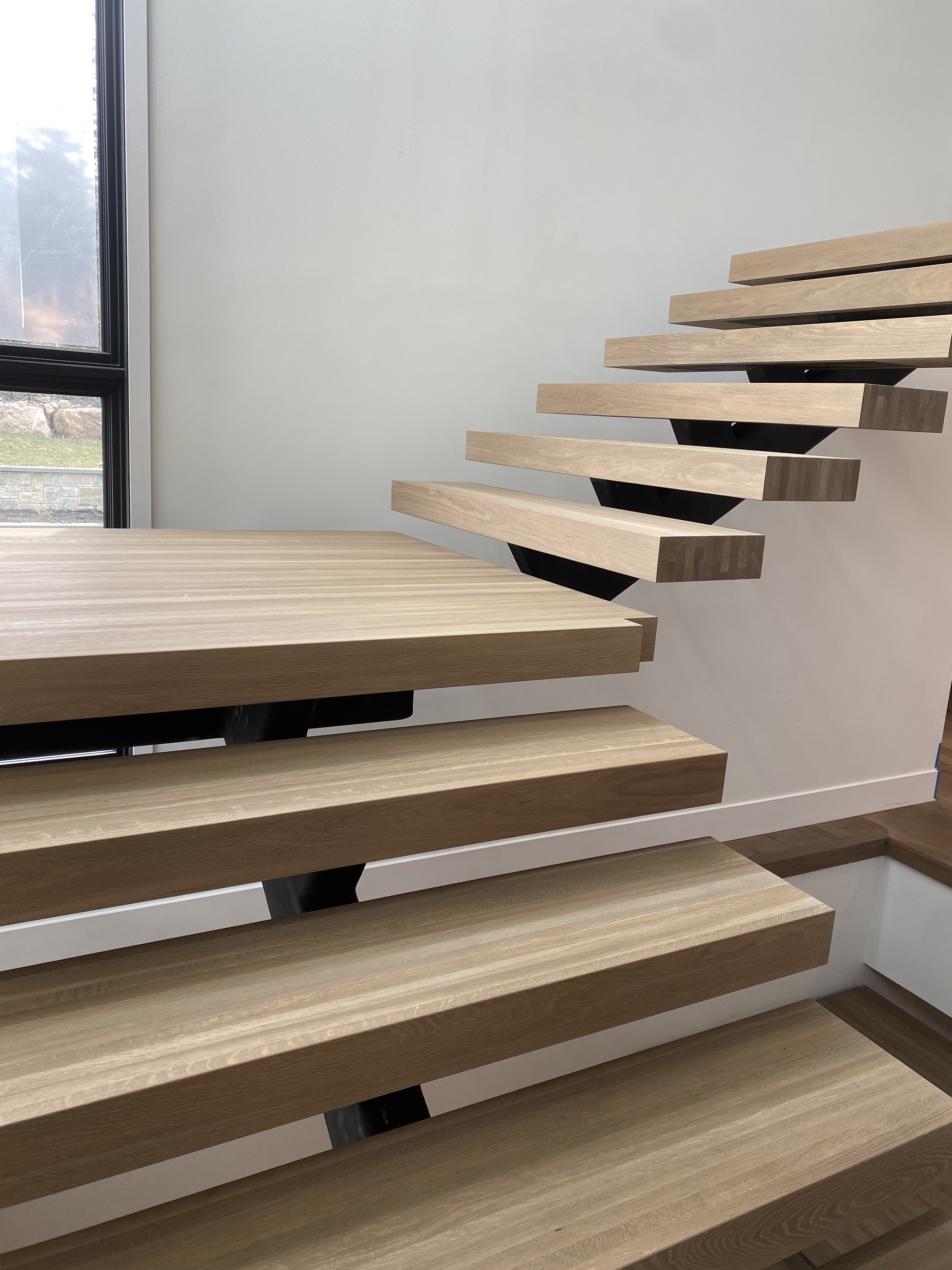 Refinished hardwood staircase detail