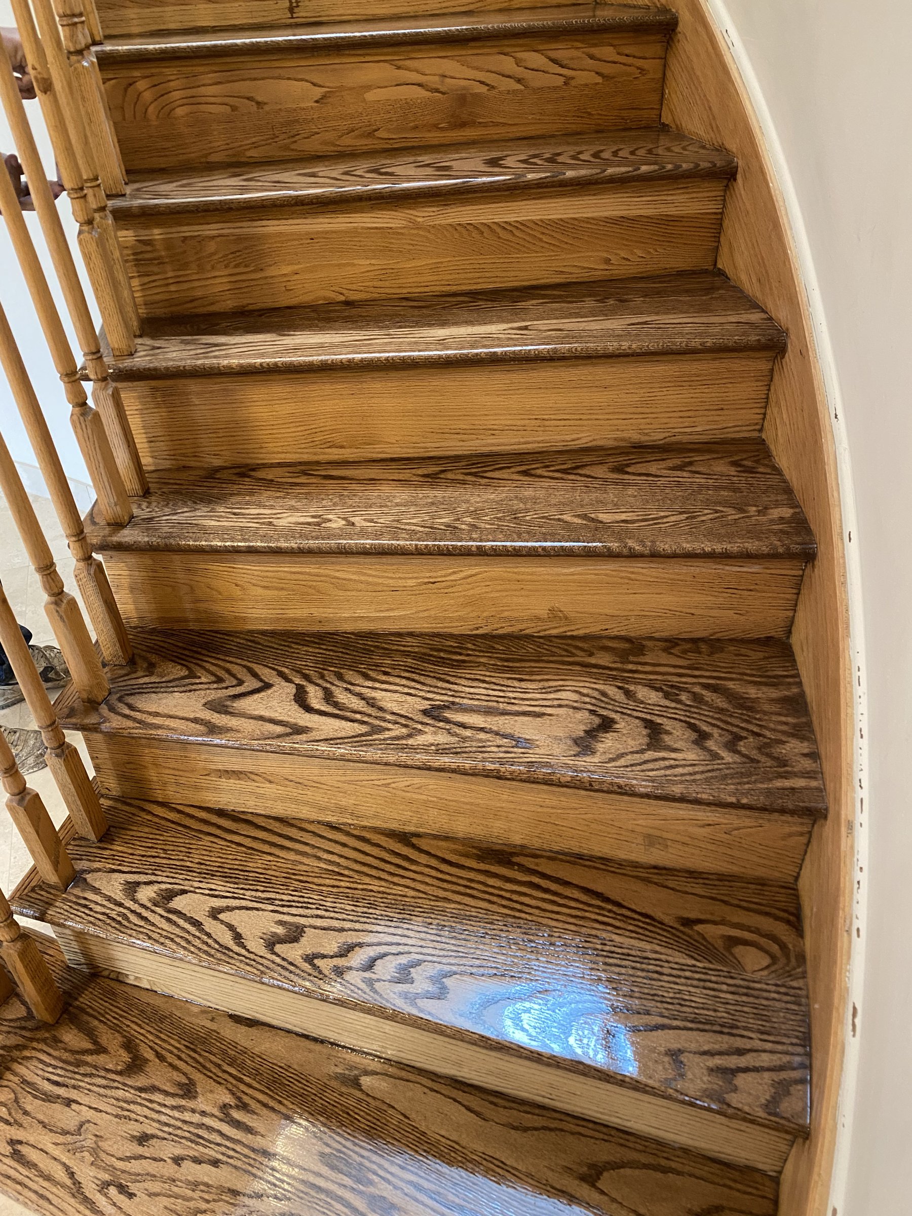 Refinished hardwood floor with rich stain